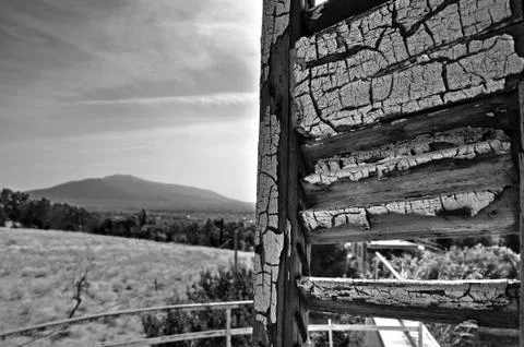 Peeling shutter distant city view Fotos de archivo