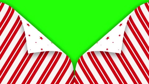 Peeling stripy candy cane gift wrap on a chroma green background Stock Footage 314320378