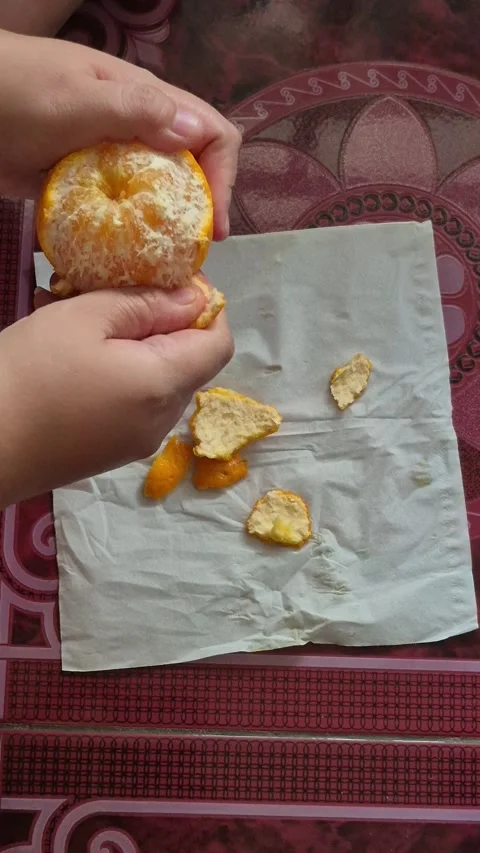 Peeling sweet tangerine Stock Footage 339058632