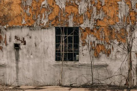 Peeling walls on a building facade Stock Photos