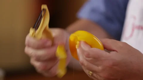 Peeling A Yellow Bell Pepper Stock Footage 27295877