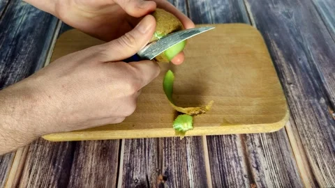 Peels the kiwi Stock Footage 227722461