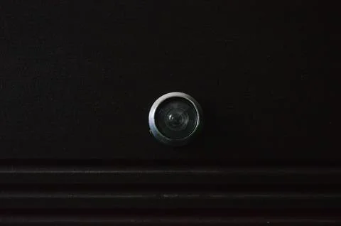 The peephole at the door close up. Foto stock