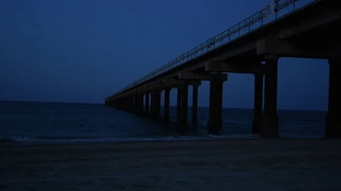 Peer on Beach at Night Stock Footage