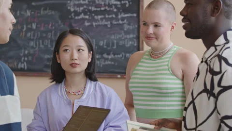 Peer Group Having Discussion on Programming Class in College Stock Footage 257059812