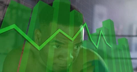 Peering shirtless man analyzing data in studio, translucent green 3D bars and Stock Photos
