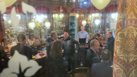 Peering Through The Window Of A British Pub in London Stock Footage 154080098