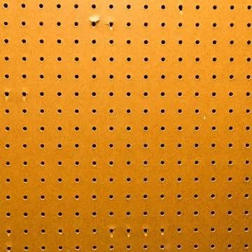 Peg board texture closeup Stock Photos