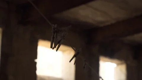 Pegs on abandoned wire Stock Footage 73675004