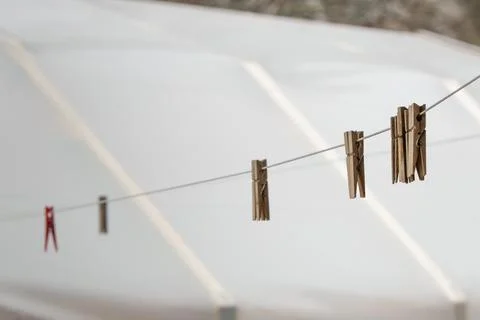 Pegs hang without laundry. Getting ready for laundry. Stock Photos