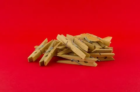 Pegs Red Background Stock Photos
