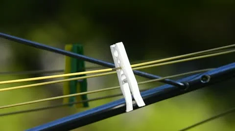 Pegs on washing line Stock Footage 11115341