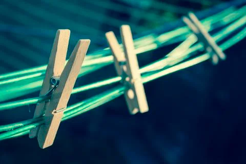 Pegs on a washing line Stock Photos
