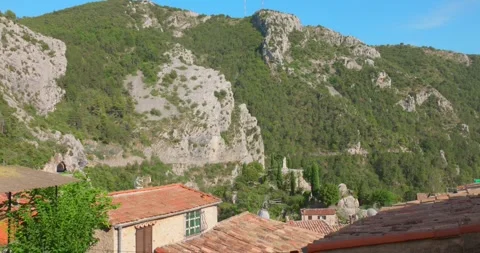 Peille Mountain Village Rooftops Below Steep Green Hillside Stock Footage 346163598