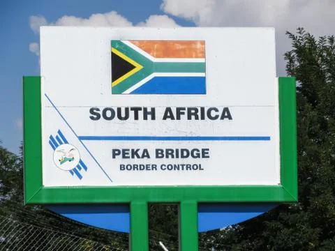 Peka Bridge border post control sign on the South African side Stock Photos