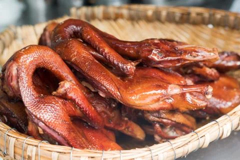 Peking duck in a basket Stock Photos