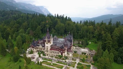 Peles Castle in forest 2 Stock Footage 72973663