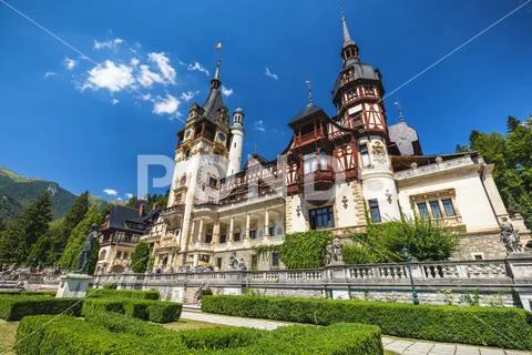 Peles Castle, Romania. Beautiful famous royal castle and ornamental garden in Stock Photos