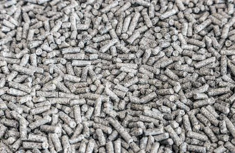 Pellets of compound feed for feeding fish, animals and birds of poultry farms Stock-Fotos
