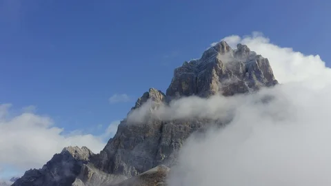 Pelmo mountain coming out from clouds, Italian Dolomites 動画素材 129810747