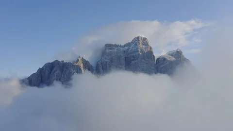Pelmo mountain in a sea of clouds at sunset, autumn, Italian Dolomites 스톡 동영상 129812494
