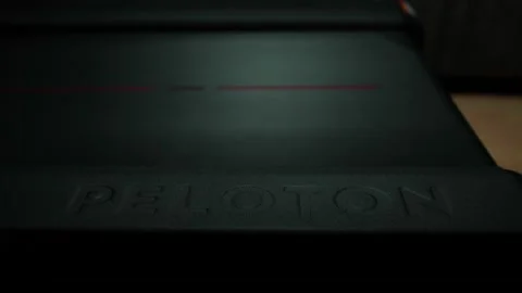 Peloton Treadmill - Embossed brand name while running - UFO Lighting Stock Footage 229951348