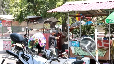 Pemalang, Central Java, Indonesia - October 8, 2023 : Three Indonesian welders a Stock Footage 252437731
