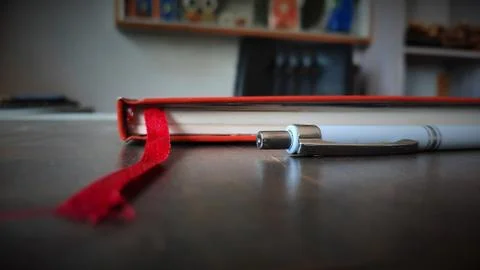 Pen and diary side view on workspace with selective focus Stock Photos