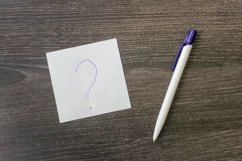 A pen and a leaf on the office table Stock Photos