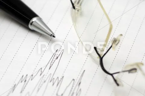 Pen and line graph Stock Photos