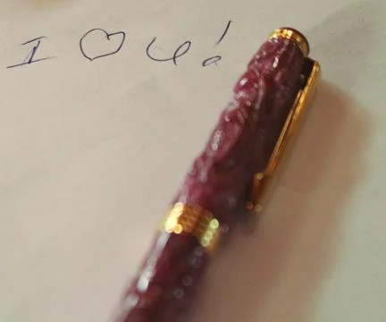 Pen and a message Stock Photos