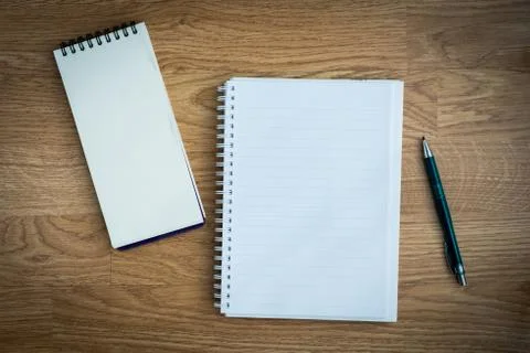 Pen and notebook Stock Photos