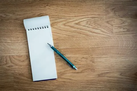 Pen and notebook Stock Photos