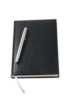 Pen and notebook Stock Photos