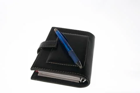 Pen and notebook Stock Photos