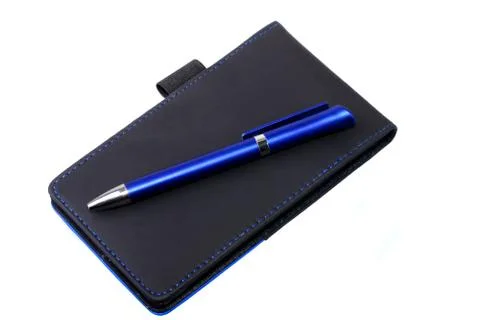 Pen and notepad Stock Photos