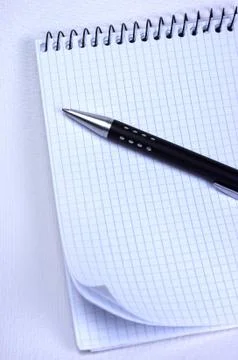 Pen and notepad Stock Photos