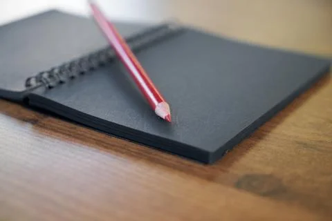 Pen and notepad on the table Stock Photos