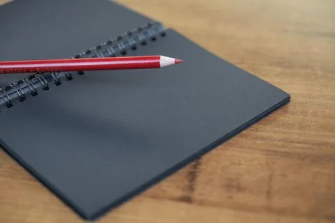 Pen and notepad on the table Stock Photos