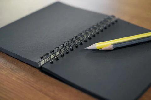 Pen and notepad on the table Stock Photos