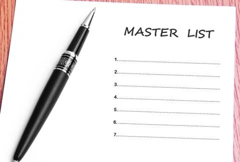 Pen  and notes paper with master list Stock Photos