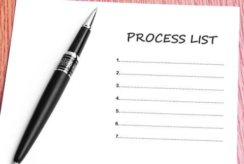 Pen  and notes paper with process list Stock Photos