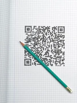 Pen and qr code on graph paper Stockfoto's
