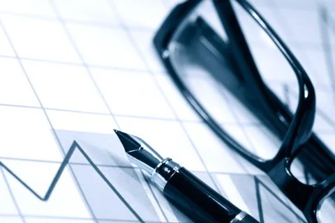Pen and spectacles Stock Photos