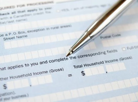 Pen on the Application Form Stock Photos