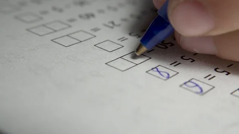 Pen Blue Closeup School Substraction Examples Education Boy Girl Math Writing Stock-Footage 117344056