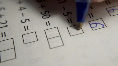 Pen Blue Closeup School Substraction Examples Education Boy Girl Math Writing Video stock 117344059