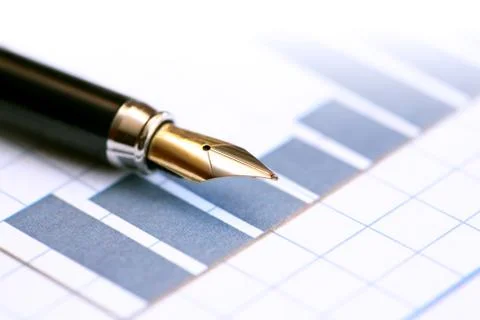 Pen on chart Stock Photos
