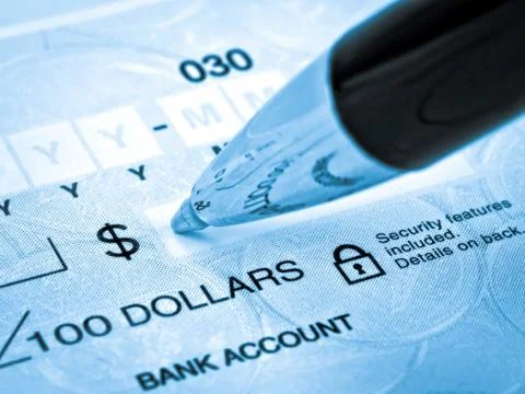 Pen on the Check Stock Photos
