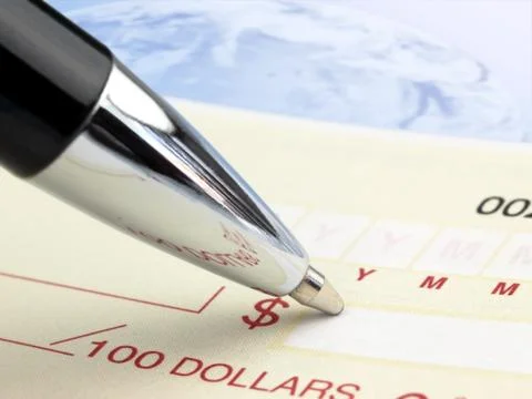 Pen on the Check Stock Photos